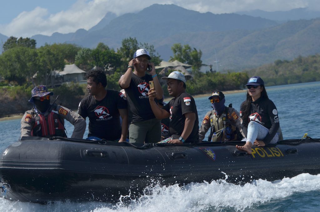 Dolphin Project team and Bali Police Marine Unit begin post-release tracking of the dolphins, West Bali, Indonesia